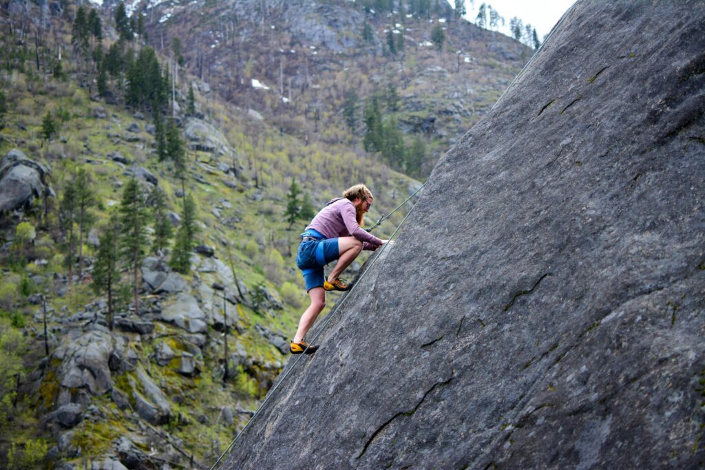 Man hiking uphill representing overcoming failure after 35
